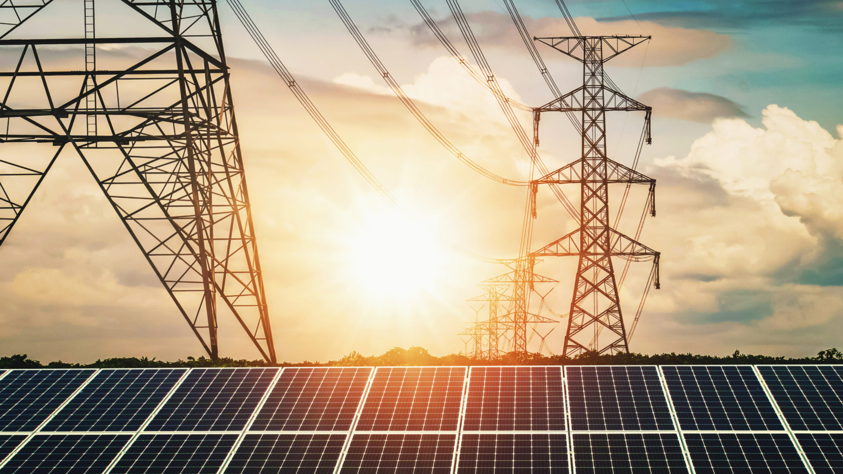 Solar panels with electricity pylon and sunset. Clean power energy concept