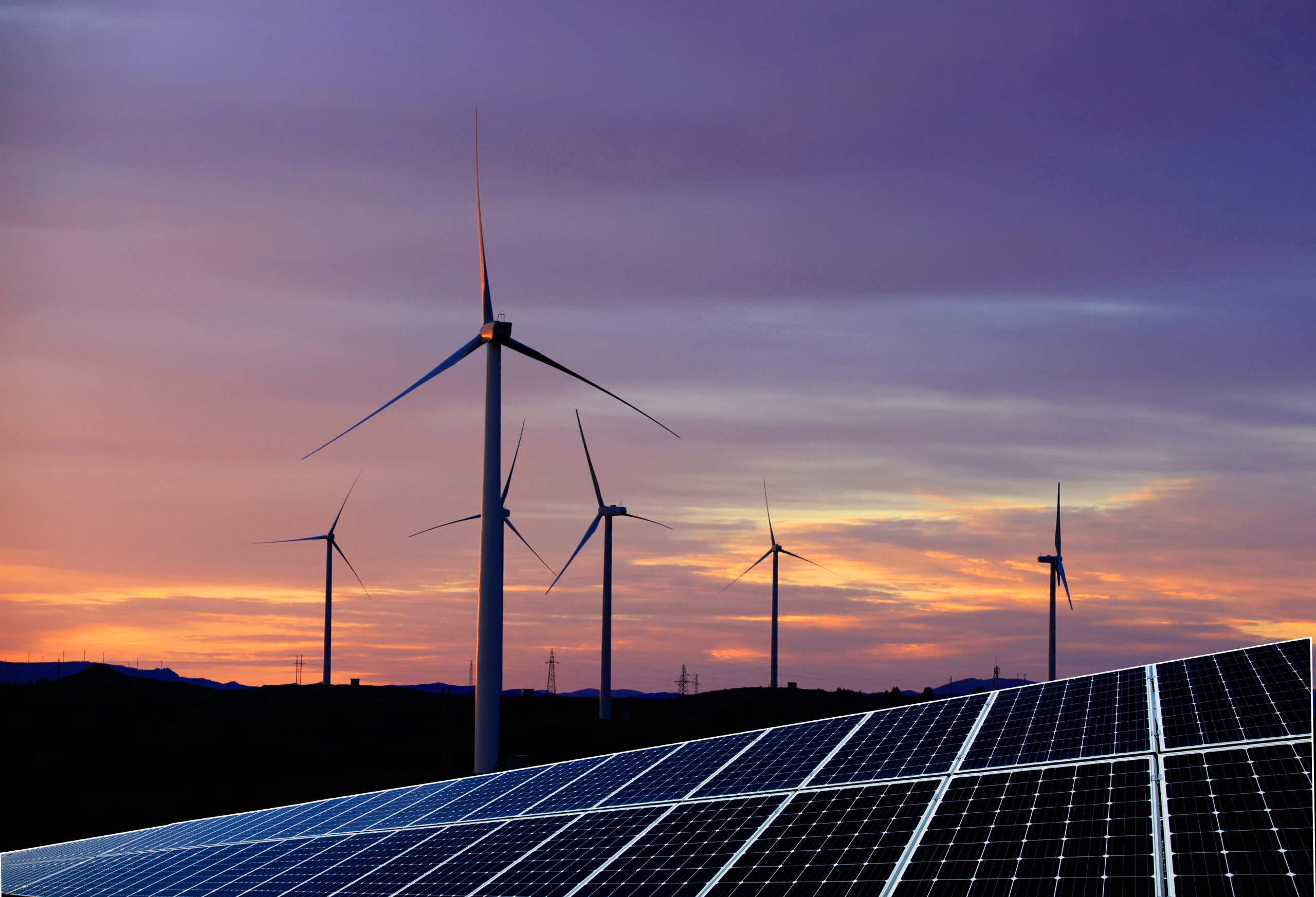 Solar photovoltaic panels and wind turbines. Energy concept